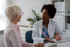 Doctor talking with patient