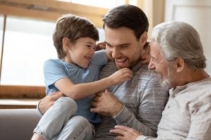 Three generations smiling together